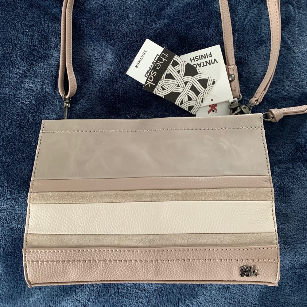 The Sak multi use crossbody/clutch/wristlet